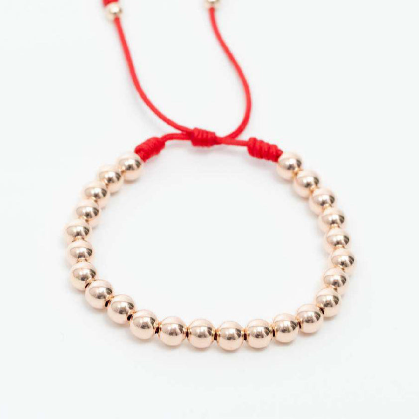 Pulsera tejida oro laminado rosa balín #6