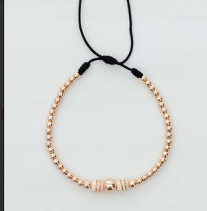 Pulsera tejida oro rosa con balín #6 #4 #3 y neopreno doble cinta