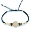 Pulsera tejida dije FE con neopreno y balín #6 y #4
