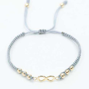 Pulsera tejida infinito con balín #4
