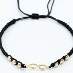 Pulsera tejida infinito con balín #4