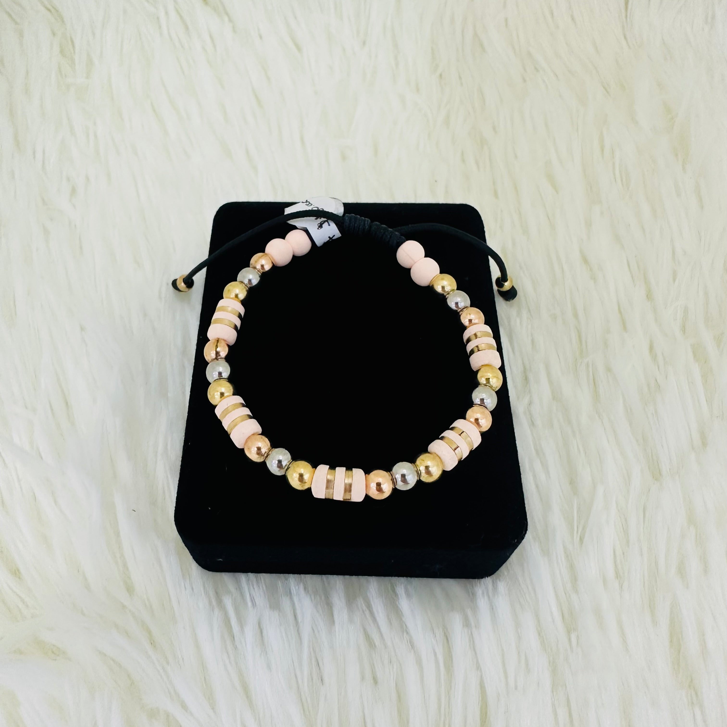 PULSERA TEJIDA BARRILES ROSADOS #4 REF 1003