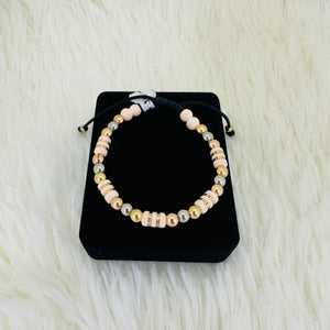 PULSERA TEJIDA BARRILES ROSADOS #4 REF 1003