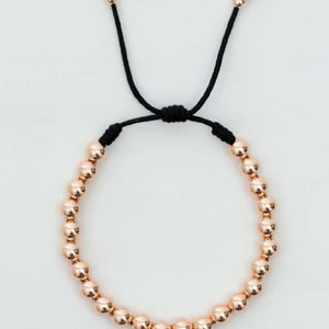 Pulsera tejida oro laminado rosa con balín #4