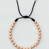 Pulsera tejida oro laminado rosa con balín #4