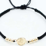 Pulsera tejida con balín liso #4 y dije san Miguel arcángel