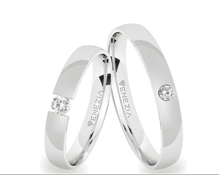 Argollas liso brillante zircon centro suizo blanco