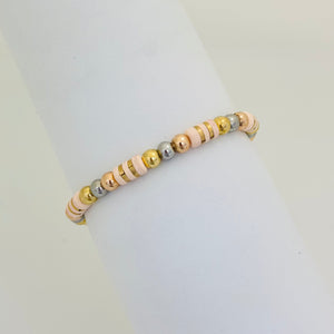 PULSERA TEJIDA BARRILES ROSADOS #4 REF 1003
